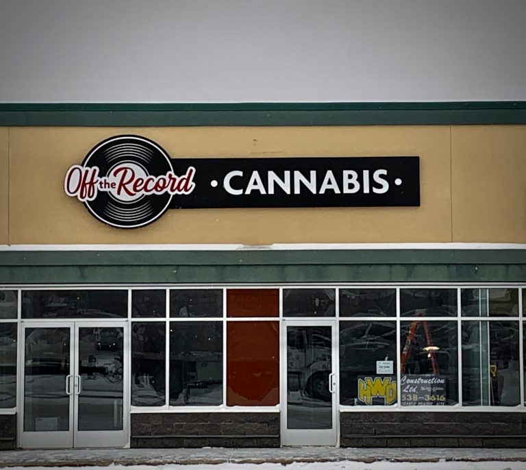 Cabinet signage for Off the Record's Cannabis