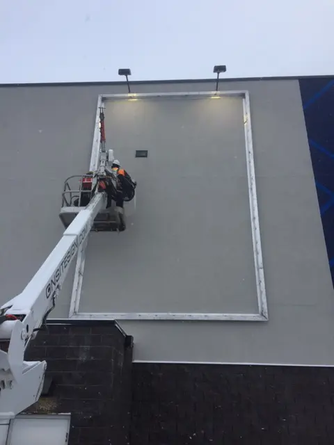 Signage installation at Cineplex Cinemas