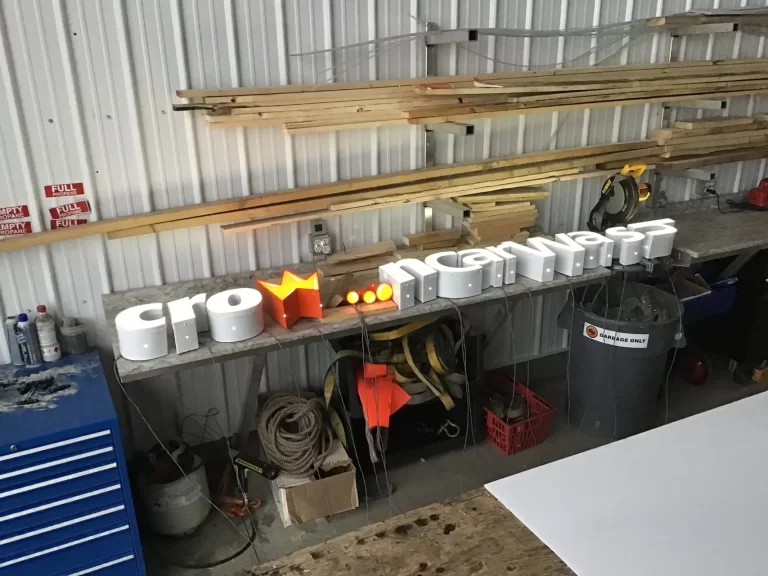 Sign being manufactured